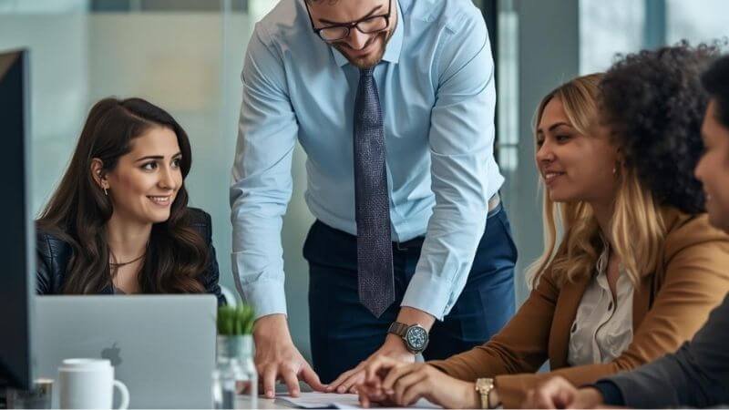 A senior technical professional mentoring junior staff.